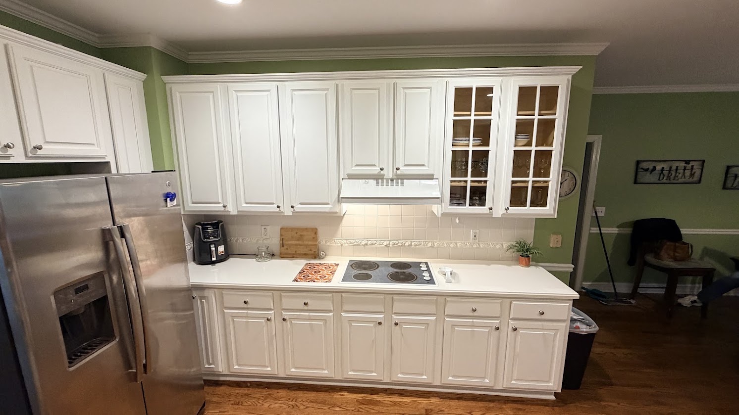 Real finished kitchen with White Flour-painted cabinets, a Cabinet Painting Guys client project