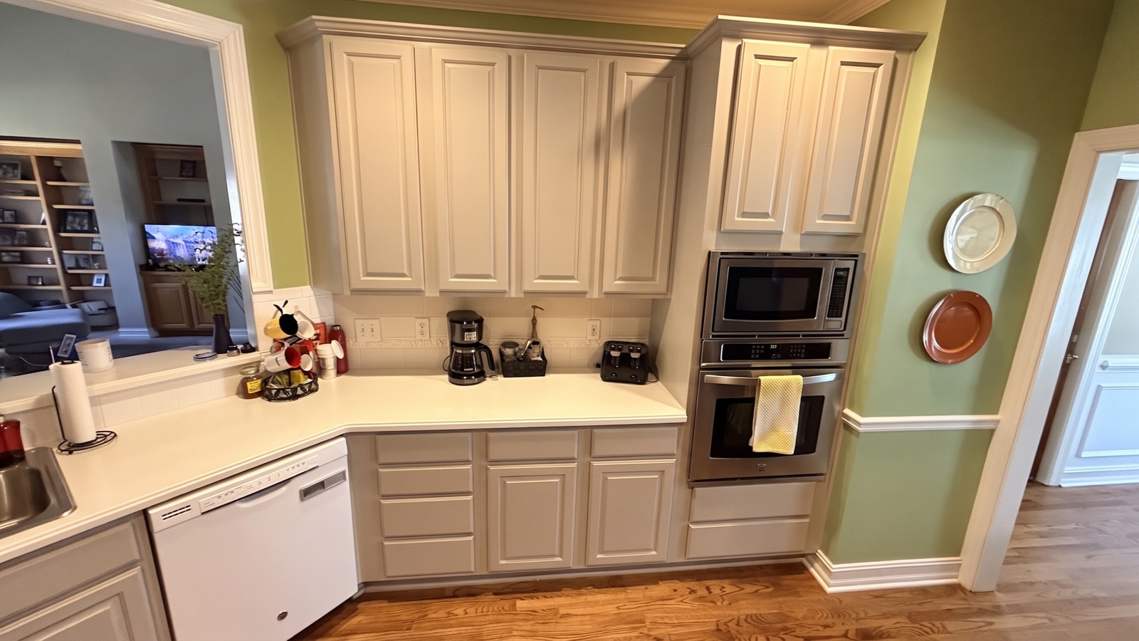 AI color preview — a real client kitchen visualized in Agreeable Gray