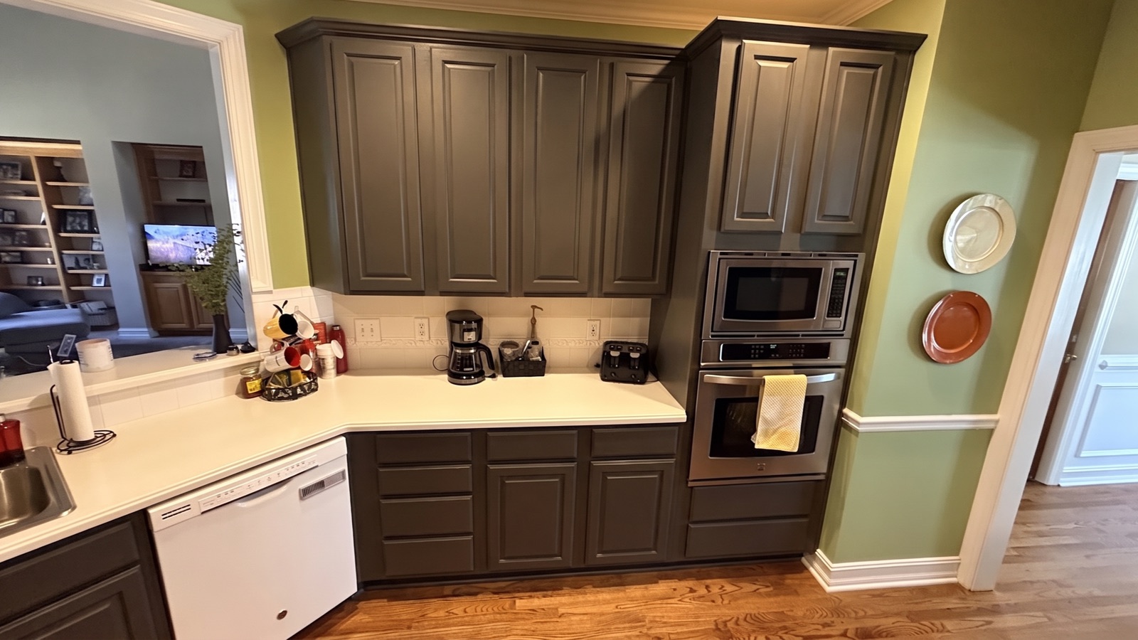 AI color preview — a real client kitchen visualized in Urbane Bronze